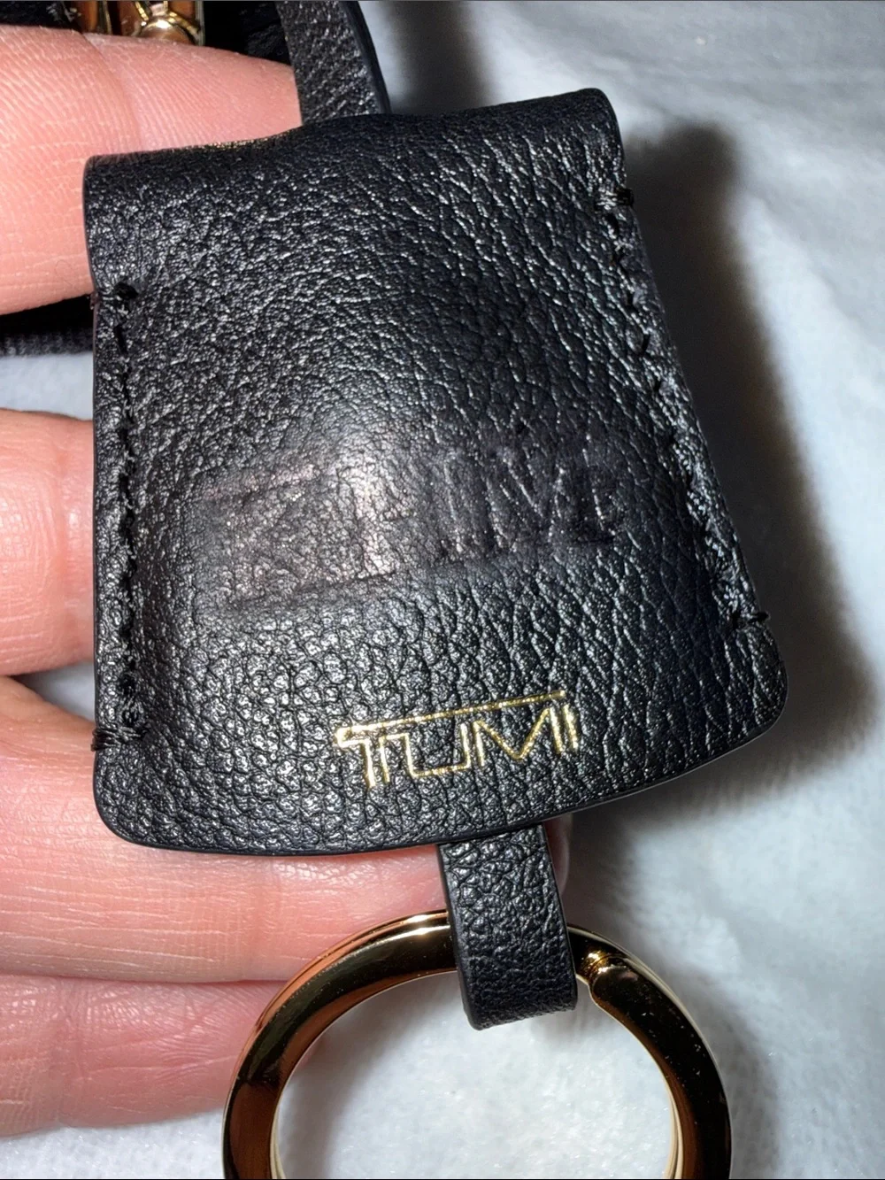 Tumi compact pebbled